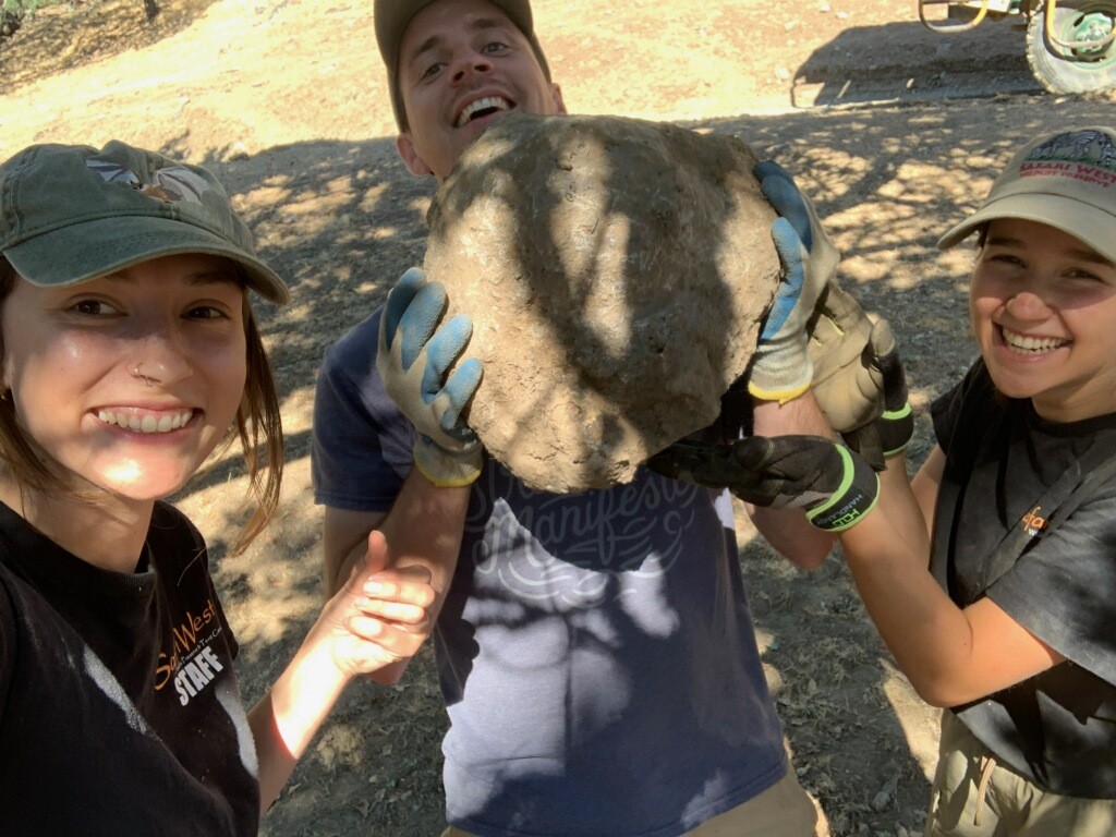 overcoming challenges - oak team and a big rock